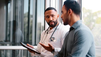 HCP: doctor speaking with patient 2166712406