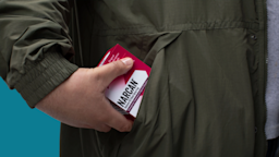 A hand places a box of Narcan in a coat pocket.
Courtesy of Emergent
