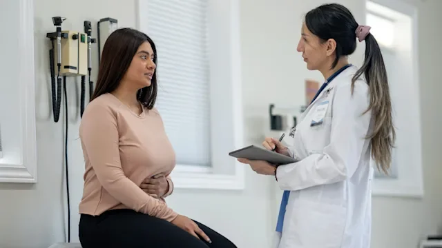 woman with abdomen pain 2242910737