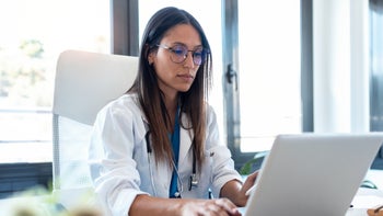 Health: Providers: doctor at laptop-1254443202