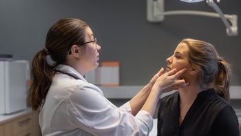 Neurological: doctor examining patient in clinic 1393811822