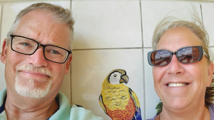 Jim Kuhn is pictured with his wife in a snapshot on a medical mission trip.