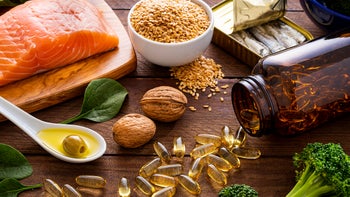 diet nutrition: overhead view with fish and supplements 1347857821