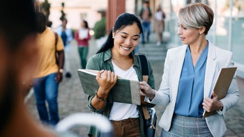 Pharmacists: Applying to school: professor and student walking-1346226355