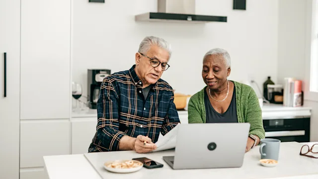 Mental health: Money: senior couple doing finances 1343586116