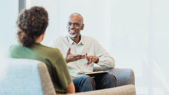 Health: Mental health: therapist speaks with patient 1305552417