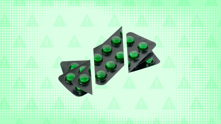 Bright-green background with texture and warning sign pattern. In the center is a pile of blister packs of green pills.