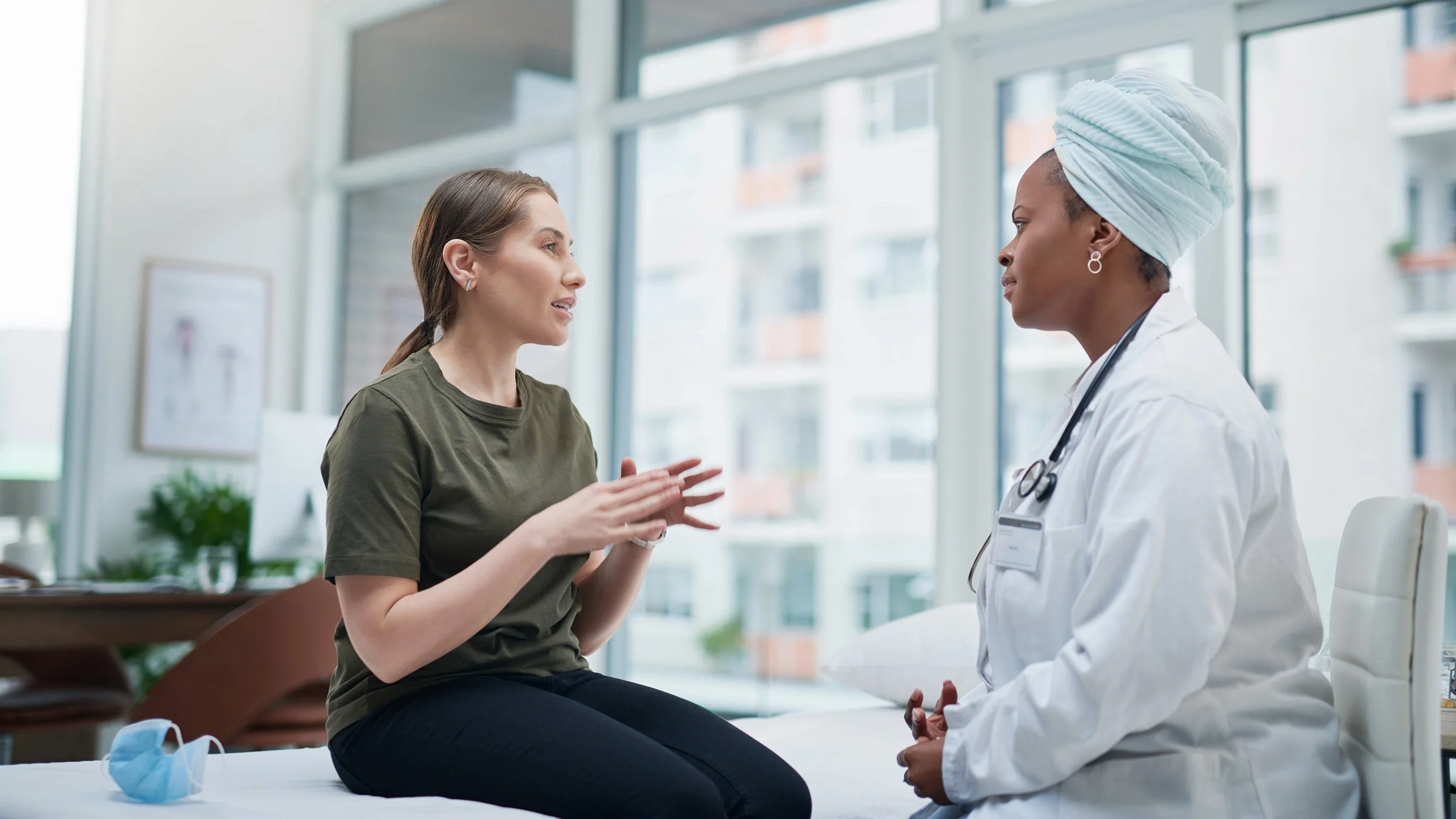 A woman talking to her doctor.
