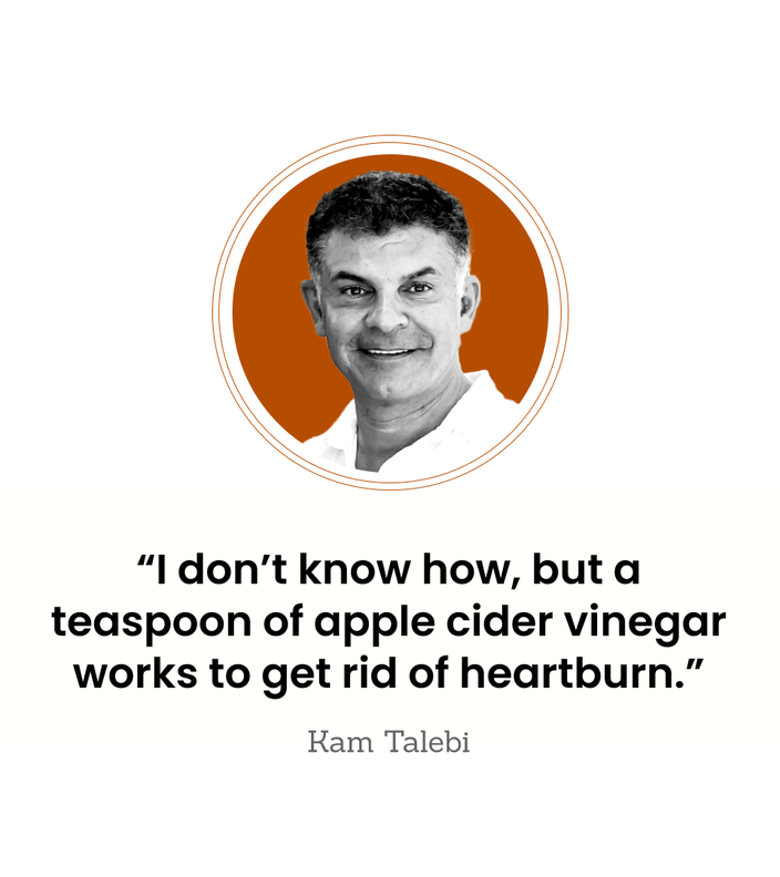 Kam Talebi is pictured in a headshot.