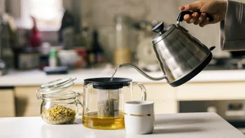 supplements-herbs: closeup brewing tea 1299171309