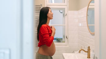 cannabis: pregnant woman doing morning routine 2162162267