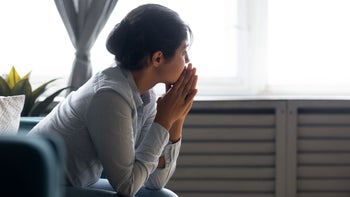 Health: Relationships: woman upset at home 1208856065