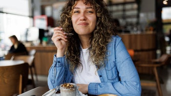 Diet and nutrition: woman eating chia pudding 1494295938
