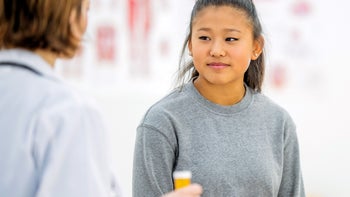 Teen Health: teenager at doctor 820813222