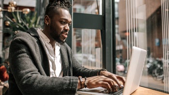 Health: Digital health: man typing on a laptop 1488348444