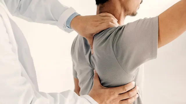 Health: Gabapentin: doctor checking shoulder rotater cuff-1161512437