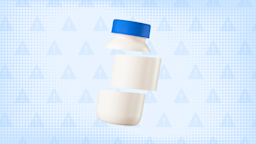 Light blue background with texture and warning sign pattern. In the center is a white pill bottle with a blue cap cut into thirds.
GoodRx Health