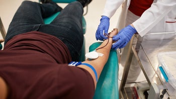 Health: Hematology: closeup man donating blood 1308423511