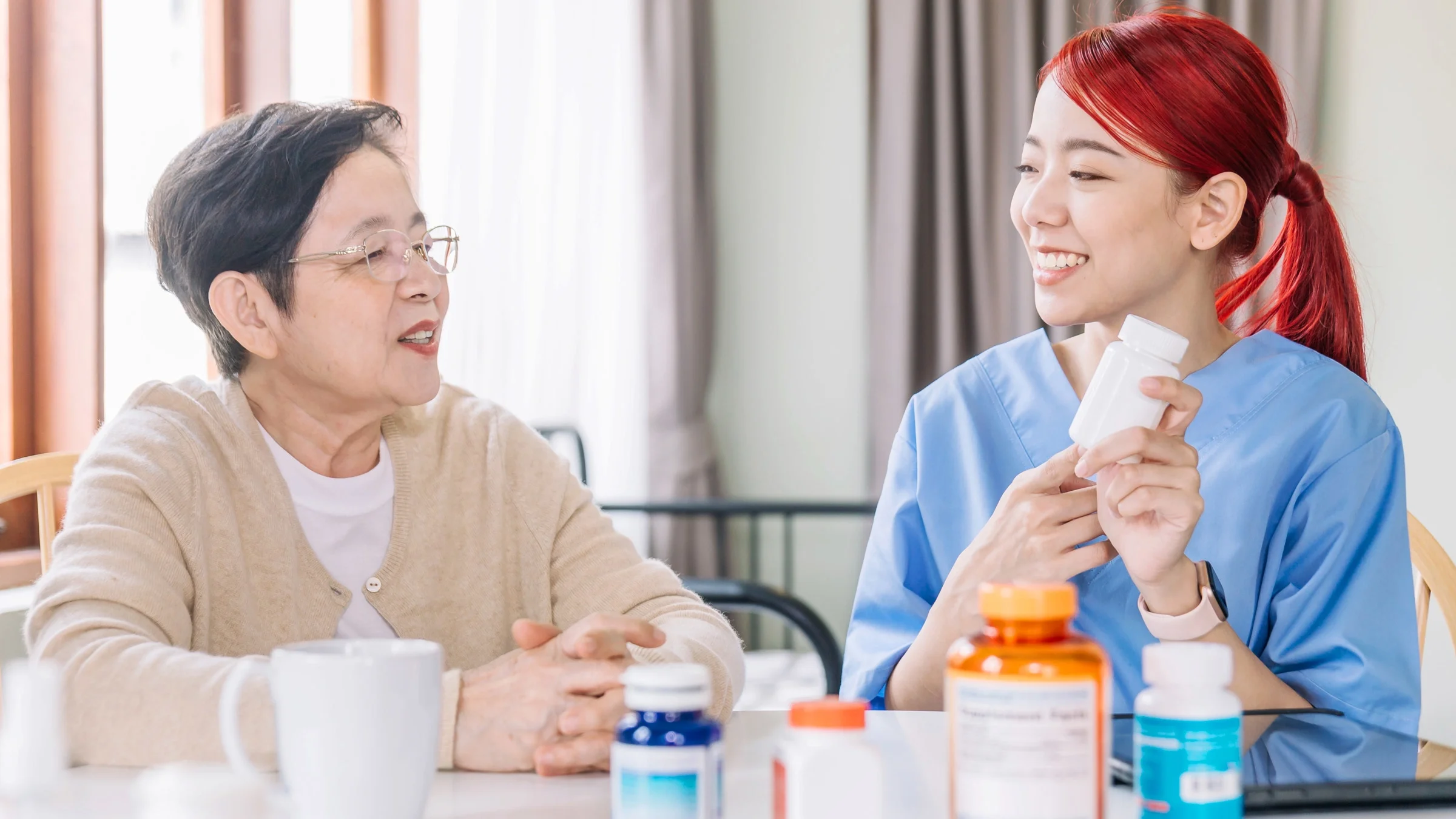 A HCP and patient discussing different medications.