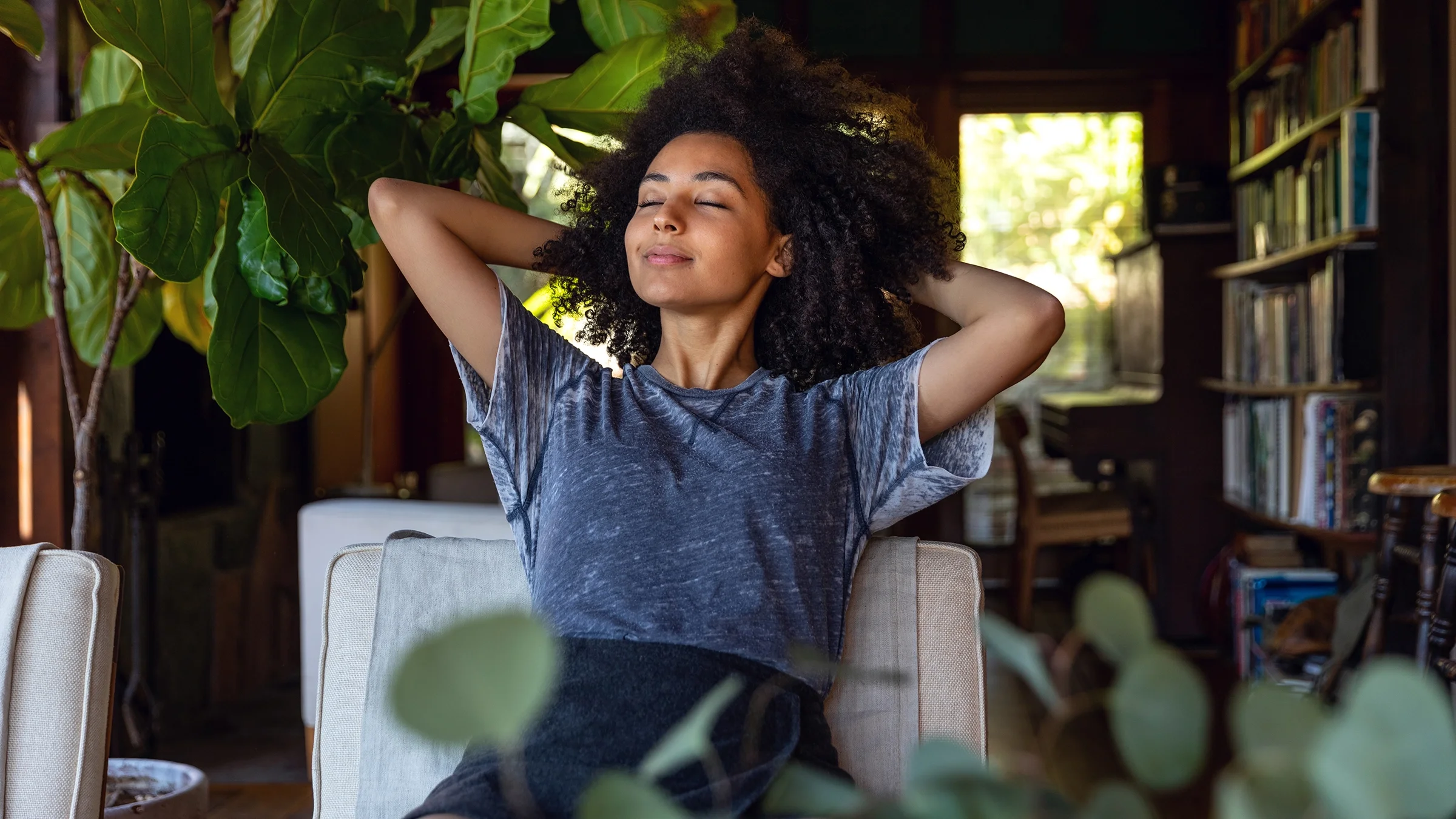 A woman takes a moment for a breathing exercise.