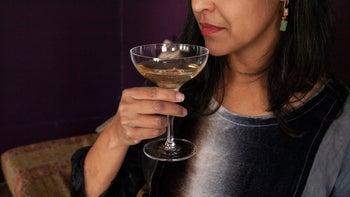 Imvexxy: closeup woman drinking champagne 1970999098