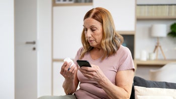 Jardiance: senior woman checking prescription 1460491789