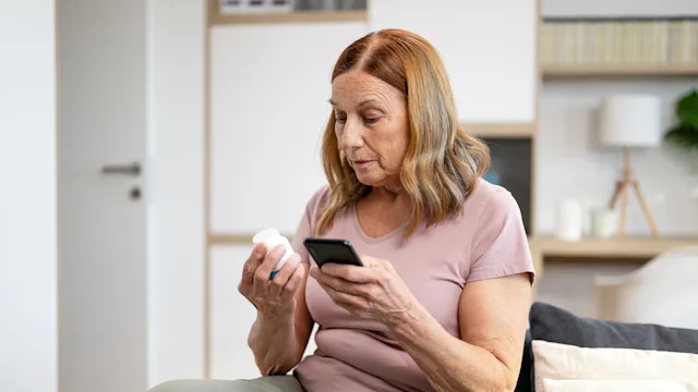 Jardiance: senior woman checking prescription 1460491789