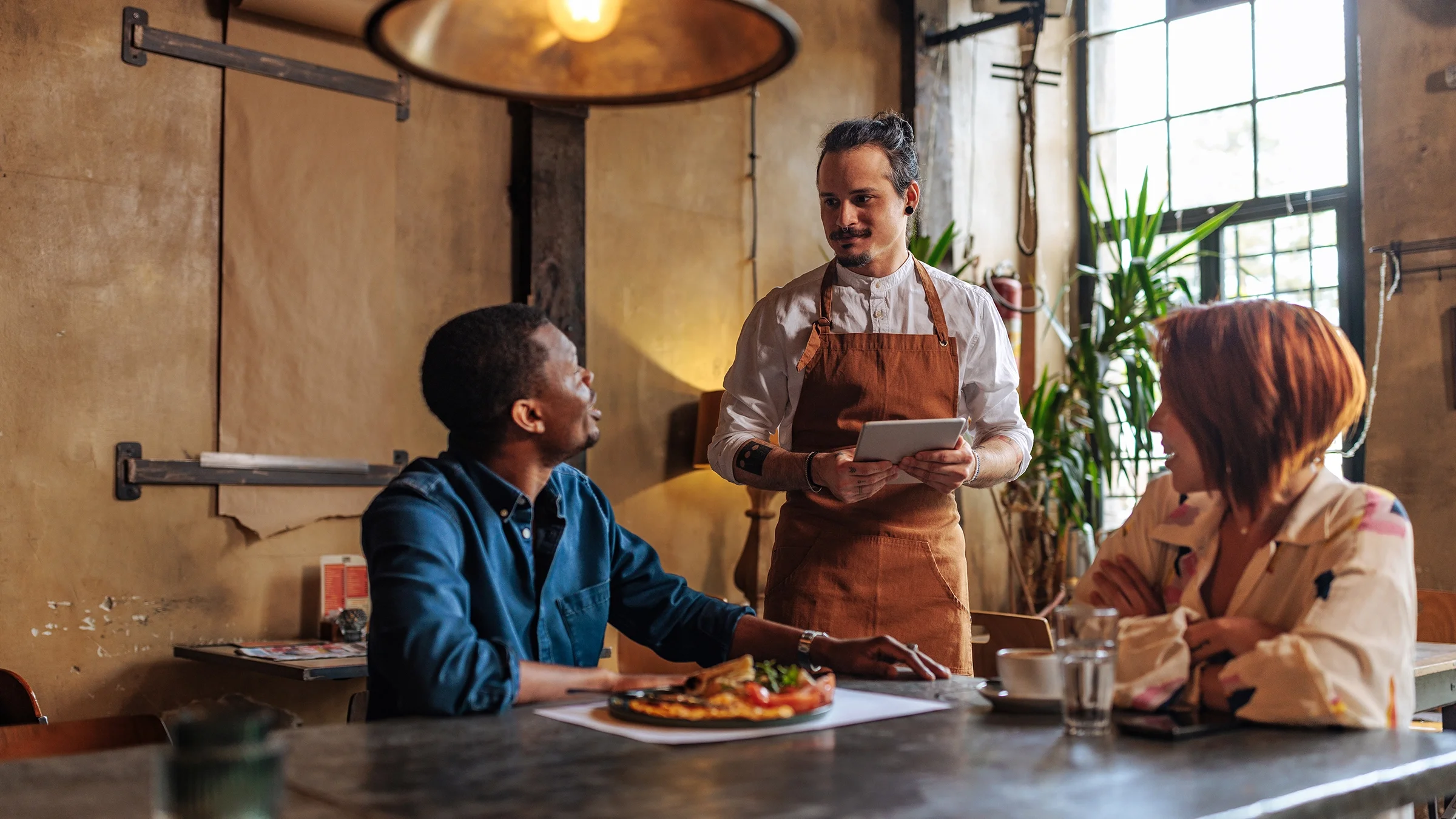 Couple ordering at a restaurant