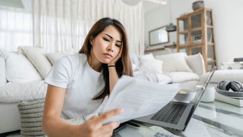 Insurance: woman doing finances 1222151483