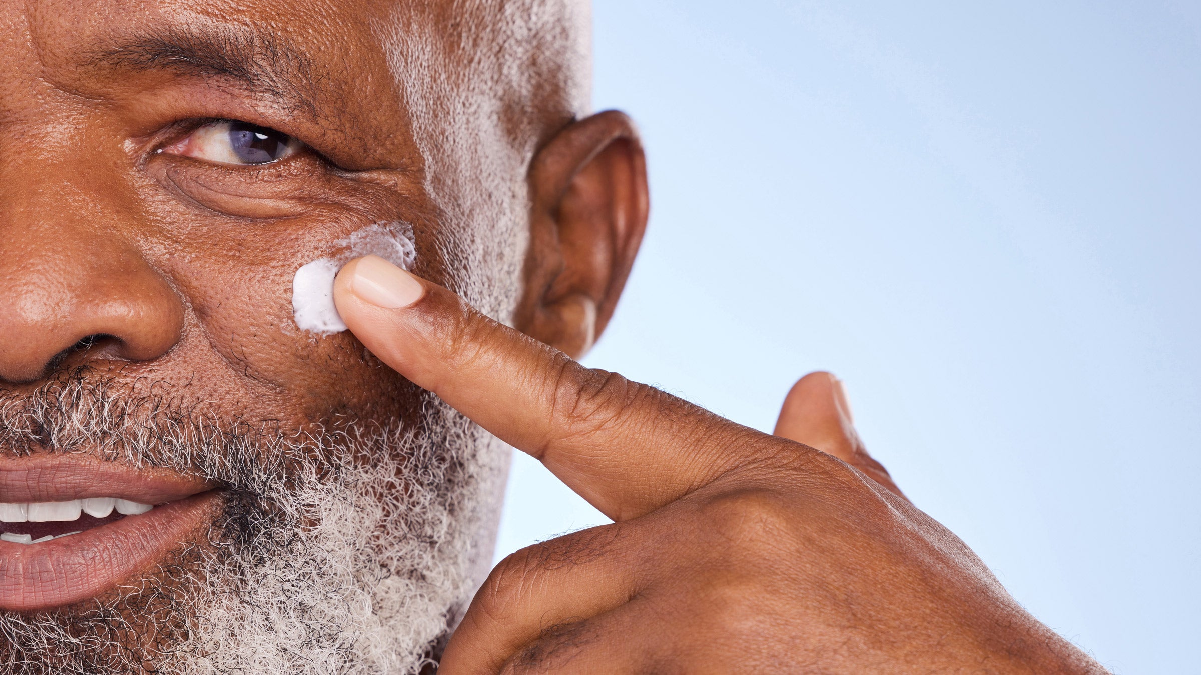 close-up applying sunscreen 1369741383