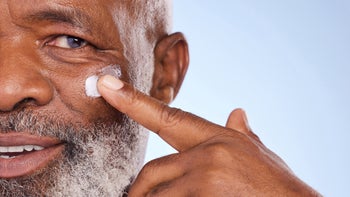 close-up applying sunscreen 1369741383