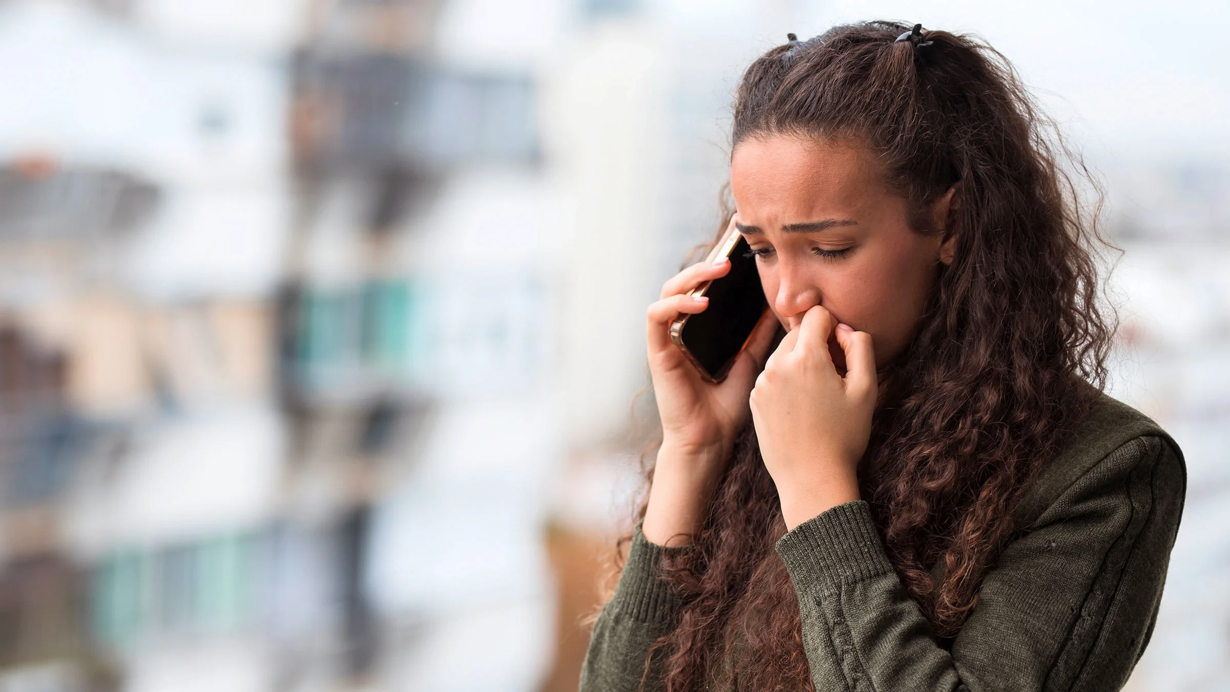 Upset woman on the phone