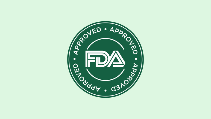 FDA Approved green seal on a light green background.