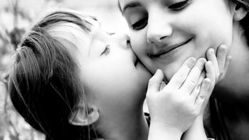 children's health: down's syndrome: sisters expressing love-462488993