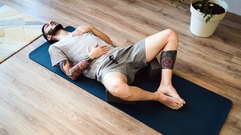Health: Stress: man doing diaphragmatic breathing exercise 1328338223