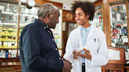 Pharmacist speaks to senior customer at pharmacy
alvarez/E+ via Getty Images
