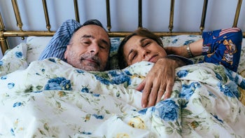 Sleep: Aging: older couple snuggling in bed 898548898