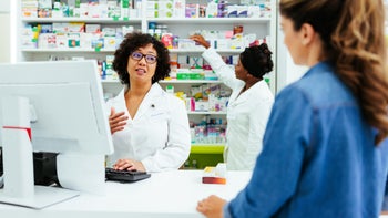 wellbutrin: pharmacist talking to customer 1405645096