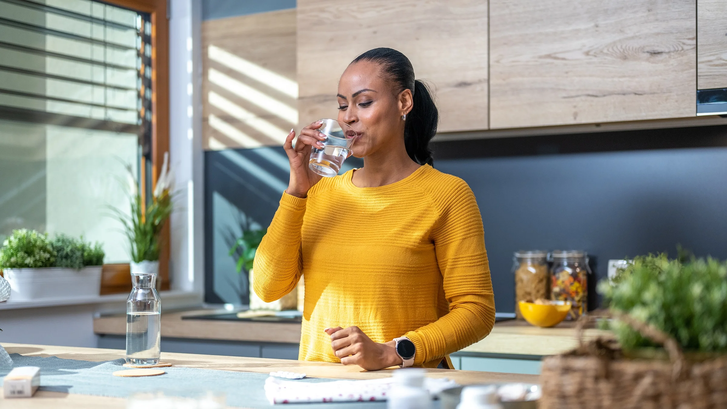 A woman takes a supplement with a glass of water. There are many popular supplements for menopausal symptoms. Some may help with hot flashes and mood changes, while others don’t have enough evidence to support their effectiveness.