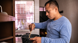 Man cooking at home.
FG Trade Latin/E+ via Getty Images