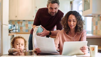 ACA: family doing finances 1313618311