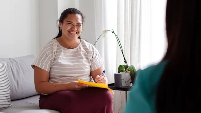 Substance use disorder: CBT: therapist taking notes 1404494265