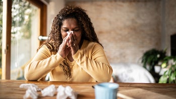 Health: Pseudoephedrine: woman blowing nose tissues 1331824622