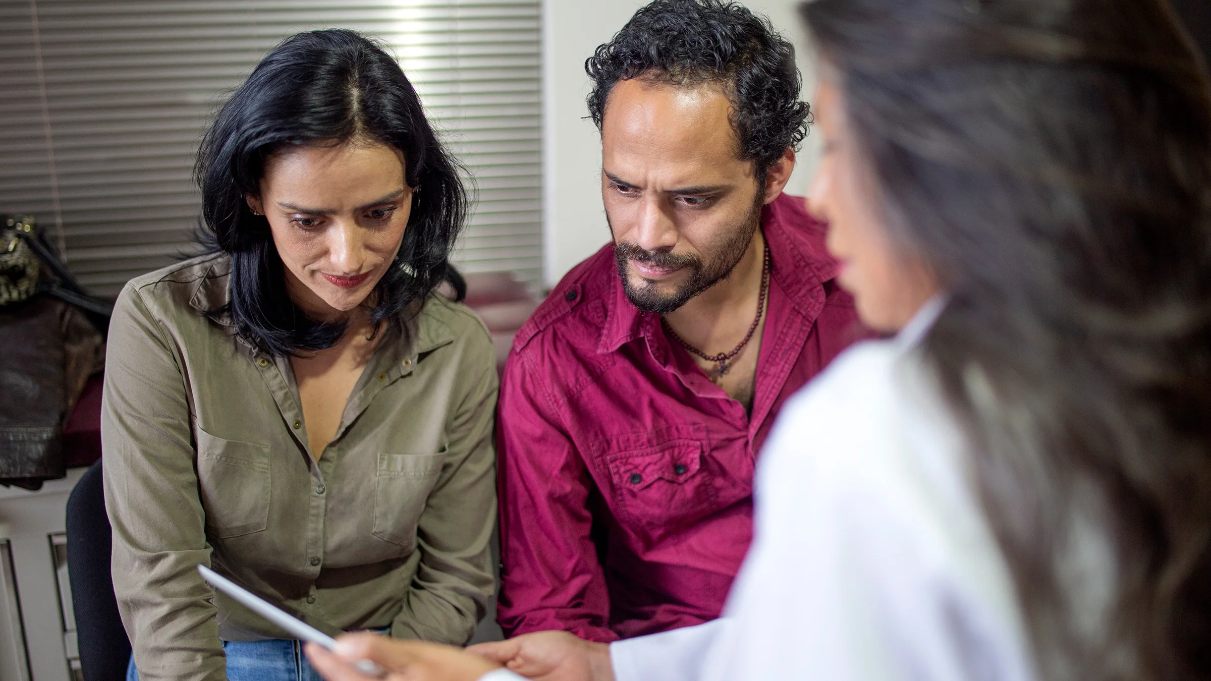 Couple in doctor's office.