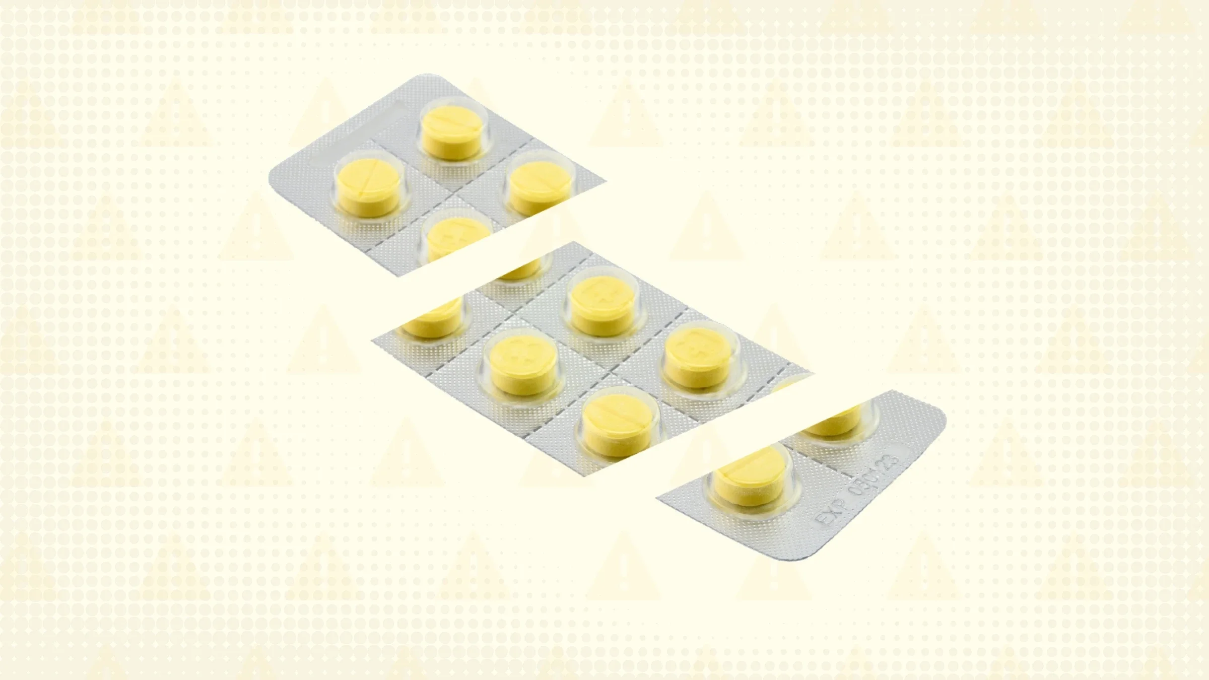 A photo of a blister pack of round yellow pills is cut into thirds.