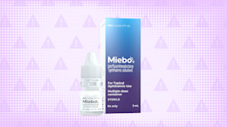 A graphic includes a light-purple, warning-sign background with an image of Miebo eye drops in the center.
GoodRx Health, Courtesy of Bausch + Lomb