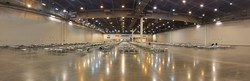NRG Stadium set up with fresh cots and ready to receive new arrivals.