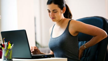 Ankylosing Spondylitis: woman with-back pain 184330493