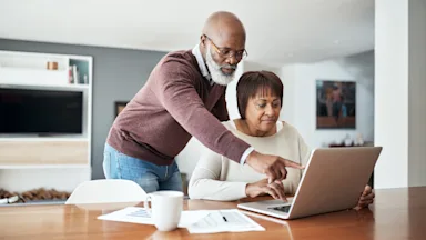 Medical debt: couple doing finances 1171730443