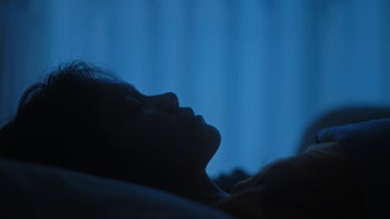Sleep: silhouette of person with insomnia 2067781517